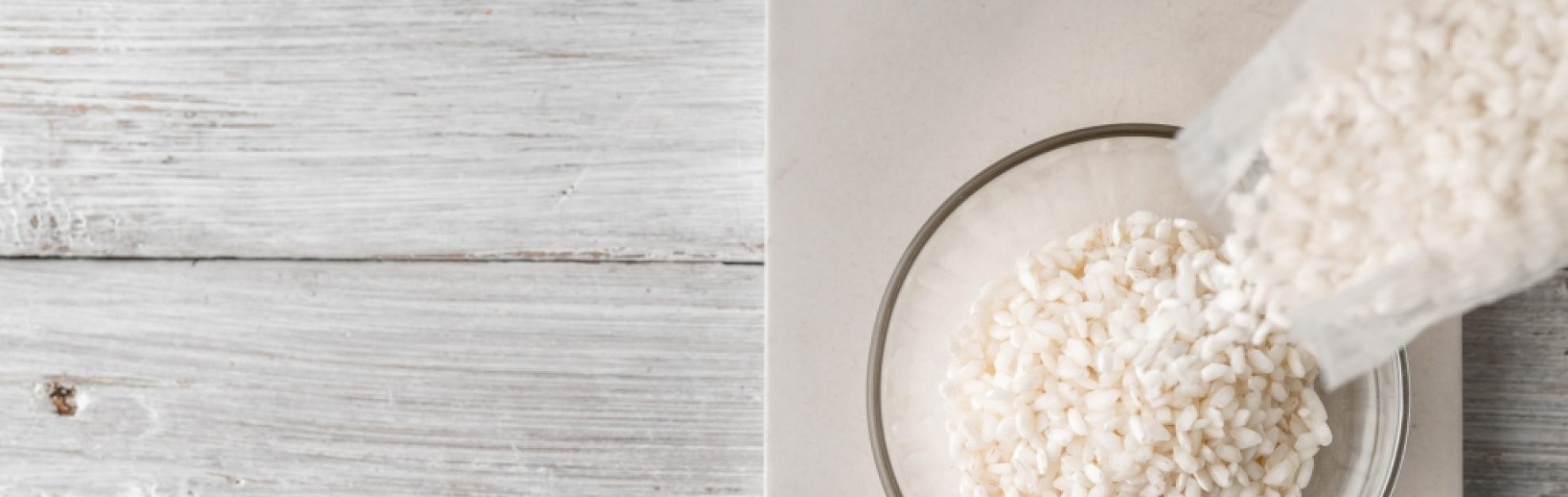 Bowl being filled with rice